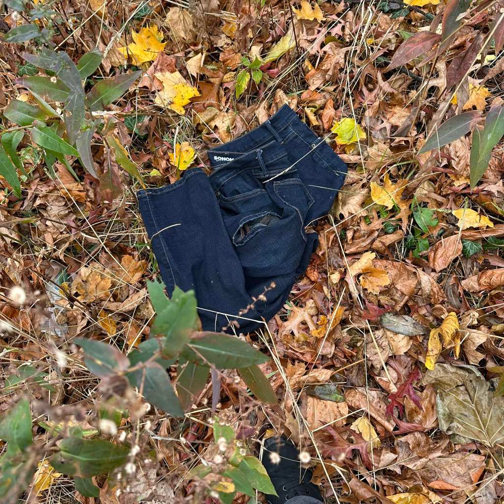 wet jeans on wet leaves